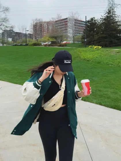 A throwback to a windy day in Burlington, wearing a sporty varsity jacket.