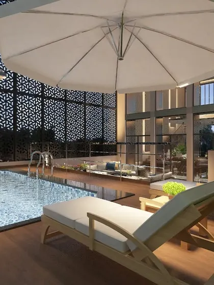The semi-enclosed rooftop pool area at the TATA Executive Floor. This space is designed for year-round use, providing a private and luxurious amenity for executives.