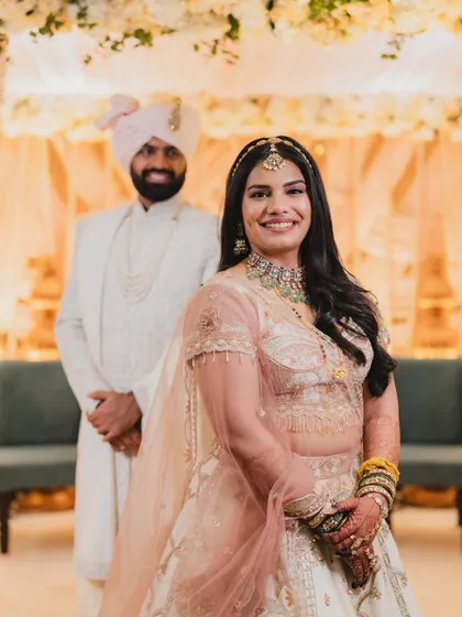 A beautiful couple portrait. The bride's makeup is clean and glowing, creating a look that is both romantic and timeless.