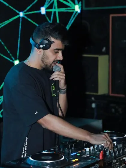 On the mic at Bombay Adda, keeping the Wednesday night energy high. I make sure even weekday parties feel like a weekend.