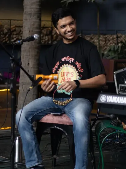 Adding some rhythm with ghungroos and a shaker. We love incorporating diverse percussion instruments to enhance our musical jams.