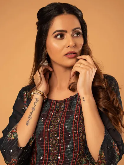 A portrait that shows off the ethnic wear and the model's personal style.