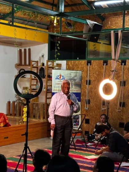 Padma Shri Dr. C.R. Chandrashekhar sharing his wisdom on the mind-body connection during a Yoga Vichara talk.