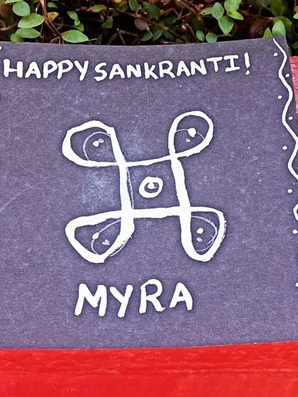 Children's artwork for Sankranti, featuring traditional symbols.