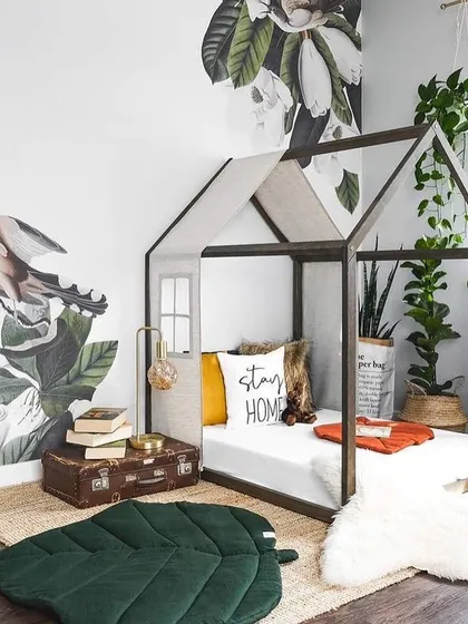 This Montessori-inspired house-frame bed is perfect for toddlers. The low-profile design allows them to get in and out independently, fostering a sense of freedom in their own magical space. It's made from solid wood with a non-toxic finish.