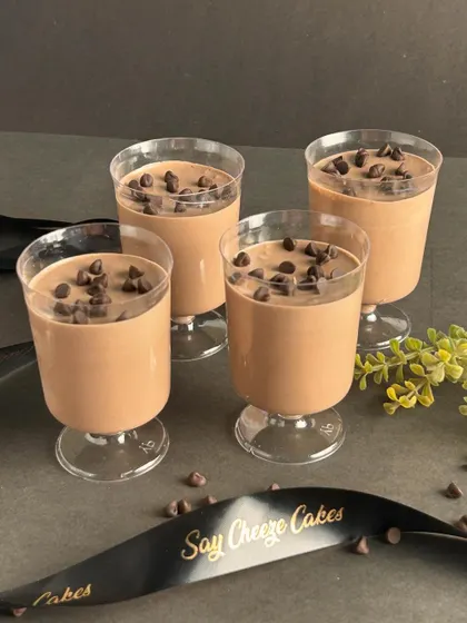 These chocolate mousse cups are light, airy, and packed with flavor. Topped with chocolate chips, they are a simple yet elegant dessert for any event.