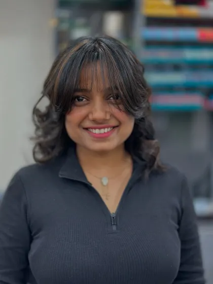Her smile says it all. The combination of the cut, color, and style has given her a fresh and joyful new look.