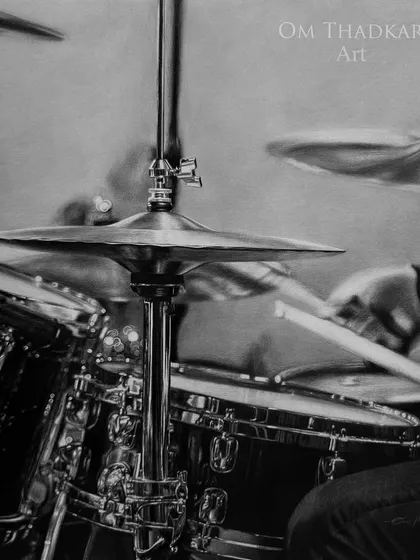 'Drumbeats', a 24 by 24 inch charcoal pencil drawing. This piece focuses on the dynamic energy of a drummer in action, highlighting the reflective surfaces of the cymbals and drums.