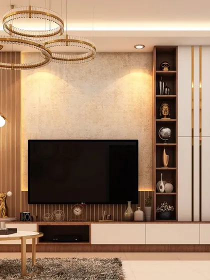This entertainment unit combines a TV display with a glass-enclosed curio cabinet. The mix of wood tones and white laminate, along with circular pendant lights, creates a balanced and functional living room feature.