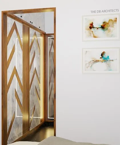 This 3D view shows the walk-in closet area of the master bedroom. The wardrobe doors feature a stylish chevron pattern with brass inlays and integrated lighting, adding a touch of glamour to the storage space.