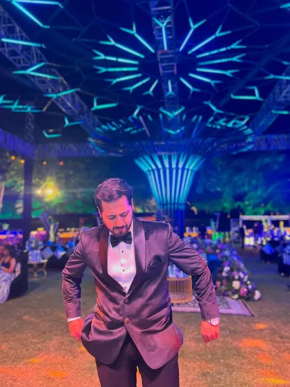 Getting into the groove at a Sangeet event with stunning, futuristic lighting decor that set the perfect mood for a party.