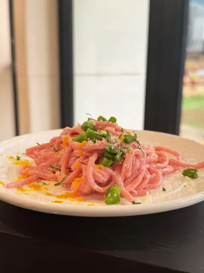 A creative twist on a classic. We infuse our Cacio e Pepe with beetroot to create this stunning pink pasta, offering a visual surprise without compromising on the rich, cheesy, and peppery flavour.