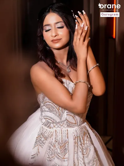 This shot highlights the delicate hand pose and beautiful nails that complete the fusion look. I teach my students that every detail matters for a polished and professional result.