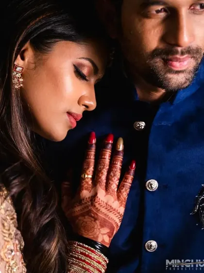 A duplicate of 298, this intimate portrait beautifully showcases the bride's henna stain.