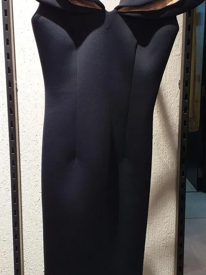 A classic little black dress with a unique off-shoulder sweetheart neckline. This versatile piece is a wardrobe staple that you can get at an amazing outlet price.