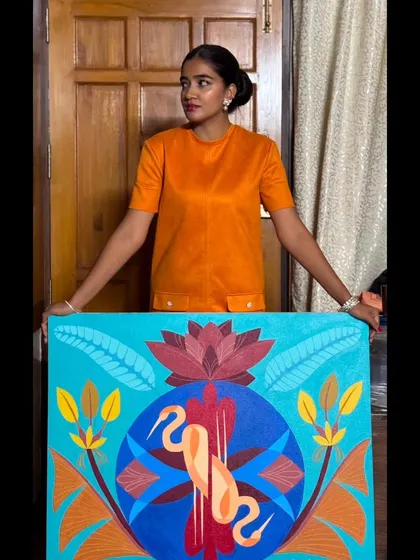 A duplicate of image 43, showing me proudly holding a recently completed custom painting. I'm so grateful for the chance to bring my clients' visions to life.