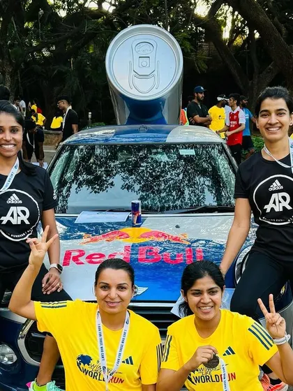 The team posing with the Red Bull Mini. Race day is always a memorable experience.