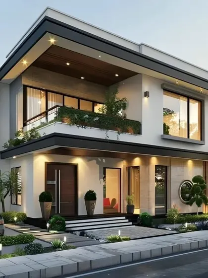 We designed this home with a focus on balanced asymmetry and indoor-outdoor living. The large first-floor balcony features a built-in planter for greenery, while the ground floor opens up to a landscaped garden, blurring the lines between the interior and exterior spaces.