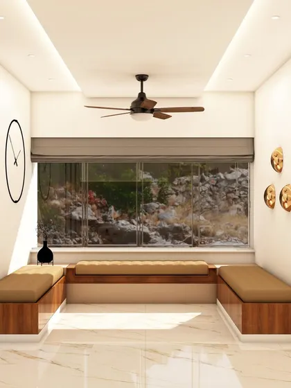 A cozy window seating arrangement with built-in benches, perfect for enjoying a cup of tea while looking out at the view. This design maximizes natural light and creates a relaxing nook.