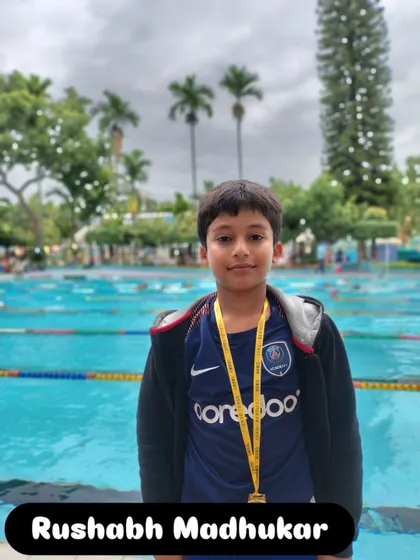 Rushabh Madhukar after his gold medal win in the 50m Butterfly.