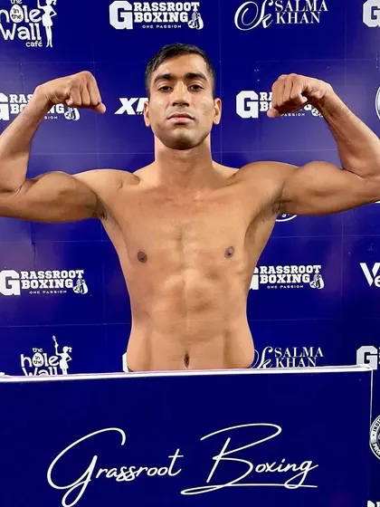 Flexing for the cameras after making weight.