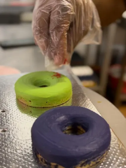 A duplicate of image 37, showing the making of Holi dognuts.