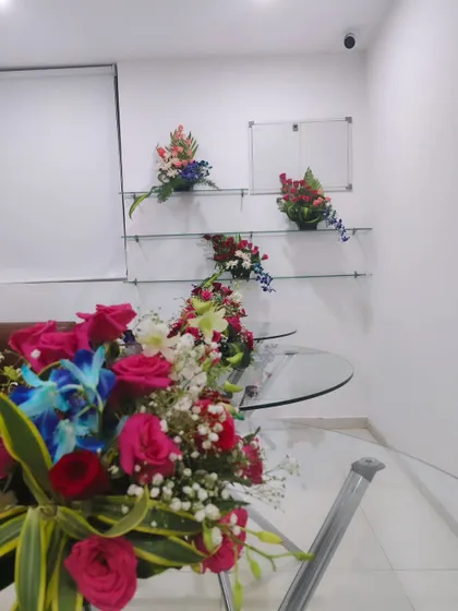 A collection of flower bouquets and arrangements ready for an event. I can create custom bouquets to match any color scheme.
