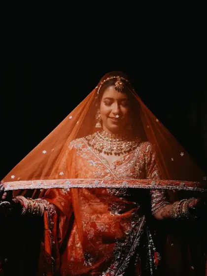 There is a timeless beauty in a bride behind her veil. This portrait is all about capturing that quiet grace and anticipation. Using soft light, we create classic bridal shots that you will cherish forever.