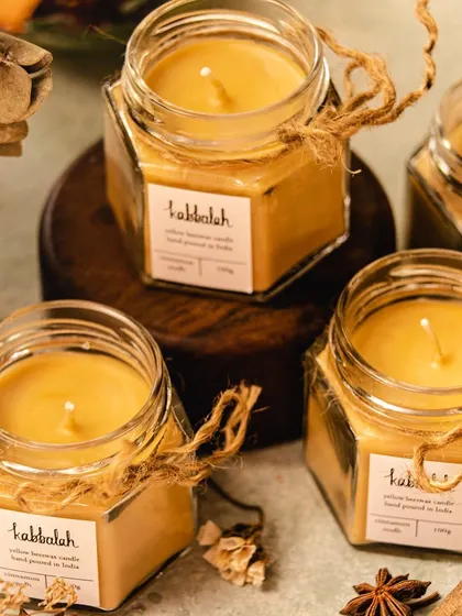 My yellow beeswax candles are hand-poured into beautiful glass jars and tied with jute string. This Cinnamon Oudh scent is warm and comforting, perfect for creating a relaxing atmosphere at home.