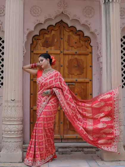 A dynamic shot where the saree's pallu is flowing, creating a sense of movement and grace. The pose is both powerful and elegant.