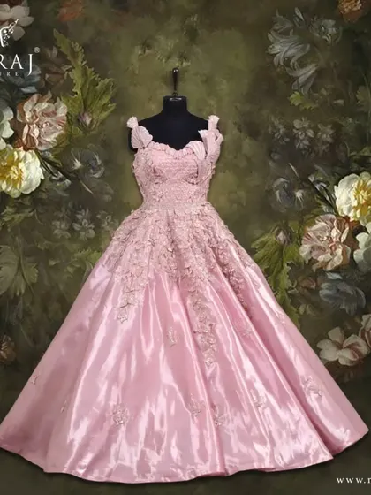 Another view of the peach gown, showcasing its charming design and delicate floral appliqué.