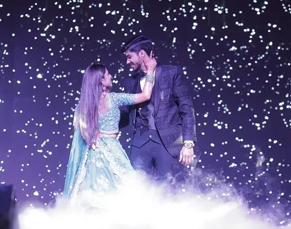 A romantic moment from a couple's first dance, complete with a starry background and smoke effects. We help create a truly magical setting.