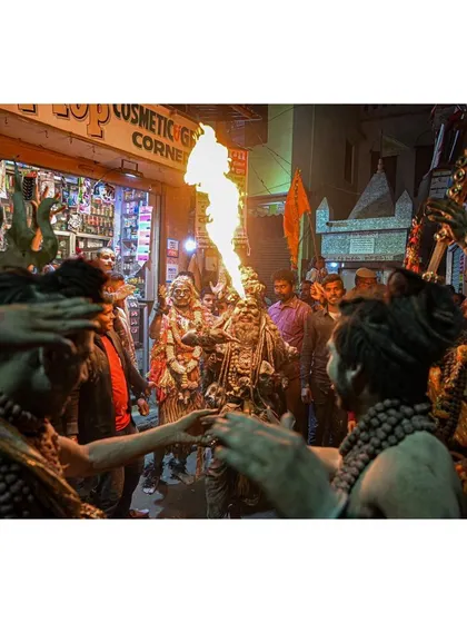 In the crowded lanes of Varanasi during a festival, a performer breathes fire, lighting up the faces of the surrounding devotees. This shot showcases my ability to immerse myself in chaotic environments to capture high-energy cultural events.