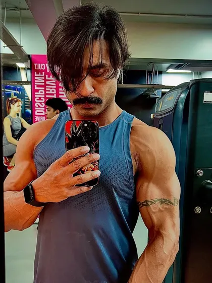 A close up selfie showing shoulder and arm development. The world needs men who act, not just talk. This physique is built on action.