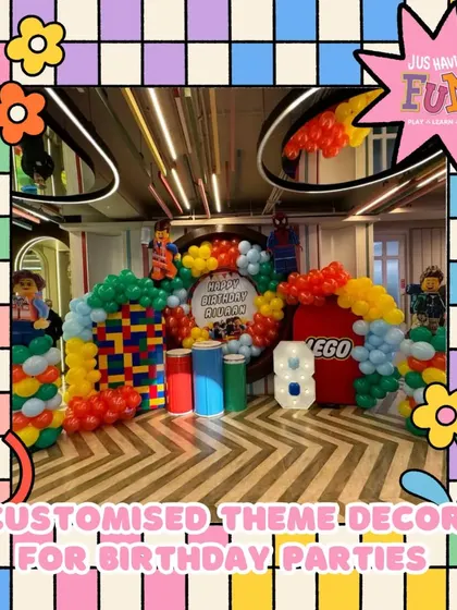 Building a world of fun with a Lego-themed birthday party. This setup uses bright, primary-colored balloons and Lego block designs to create an imaginative and playful atmosphere for little builders.