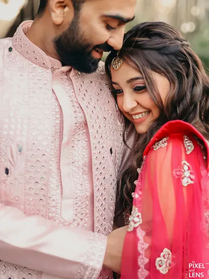A sweet couple's photo from Virakti's mehendi. Her soft pink makeup looks beautiful and romantic.