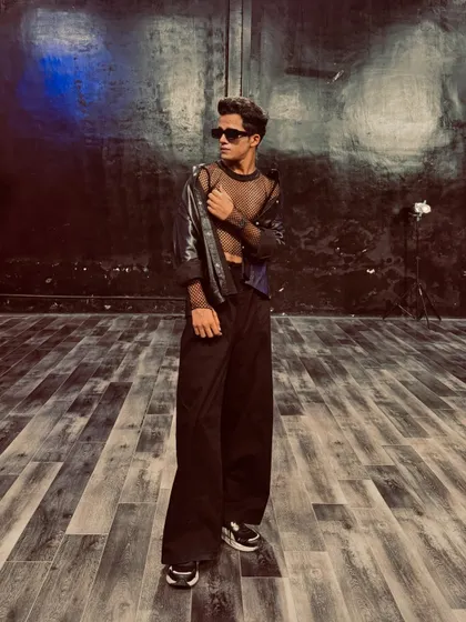 Another angle of my all-black studio look. The right outfit helps me get into character for a performance.