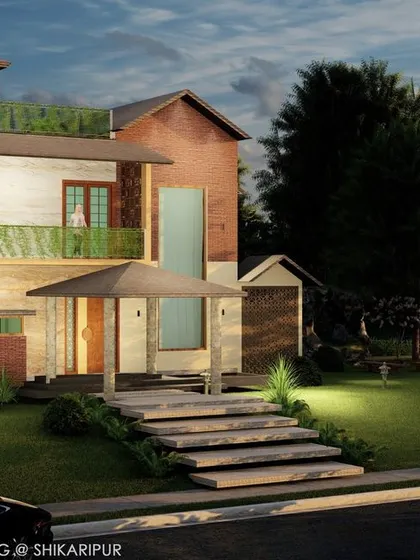 Our lighting plan for the Shikaripura residence ensures the garden is as inviting at night as it is during the day. Gentle illumination on the lawn, pathways, and entrance creates a magical ambiance while improving visibility and security.