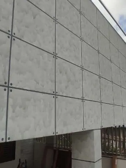 A completed exterior wall with a stylish, modern panel design. This is an example of the decorative finishes I can provide to make your property's exterior truly unique.