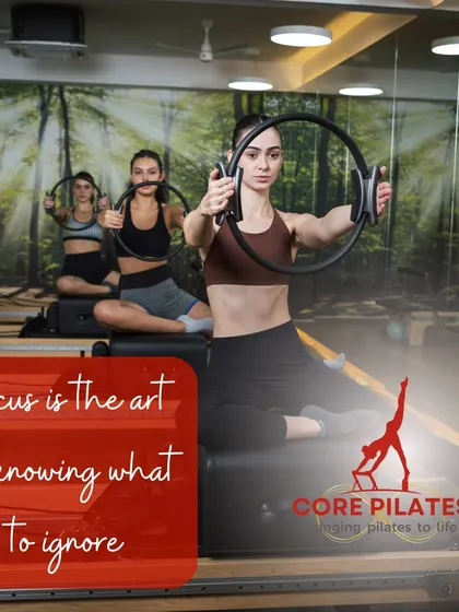 Focus is the art of knowing what to ignore. In our group classes, clients tune into their own bodies while drawing energy from the group, here using the Magic Circle for added resistance.