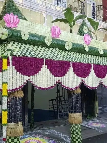 A grand chapra, or traditional welcome arch, is perfect for housewarmings and weddings. I construct these using woven palm leaves, fresh flowers, and auspicious elements like lotus flowers for an authentic and blessed entrance.