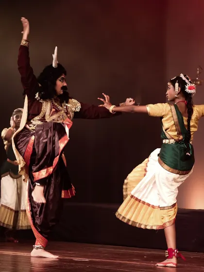 A dynamic fight sequence portrayed through dance, showcasing the dramatic potential of Bharatanatyam.