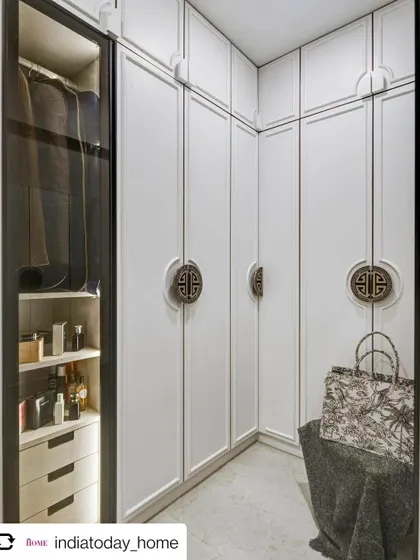The walk-in wardrobe from our 'Cedar Abode' project, as featured in India Today Home. The custom Chinese-style handles are a standout detail.