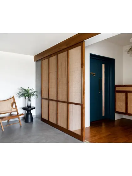 In the 'House of Skye', we used a combination of teak wood, rattan screens, and terrazzo floors to create a warm, modern aesthetic for fuss-free living.