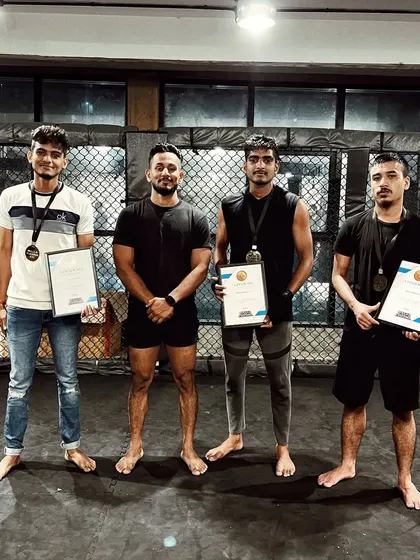Our fighters proudly displaying their medals and certificates after winning at the Mallayuddha 2.0 event. We are constantly competing and bringing home victories.