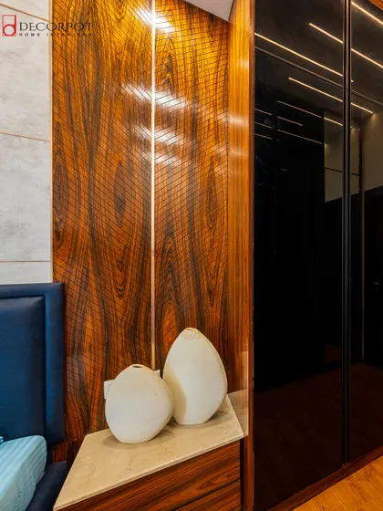 A close-up showcasing a rich, dark wood veneer with a beautiful grain and a subtle gloss finish. This material adds warmth, texture, and a sense of luxury to any piece of furniture.