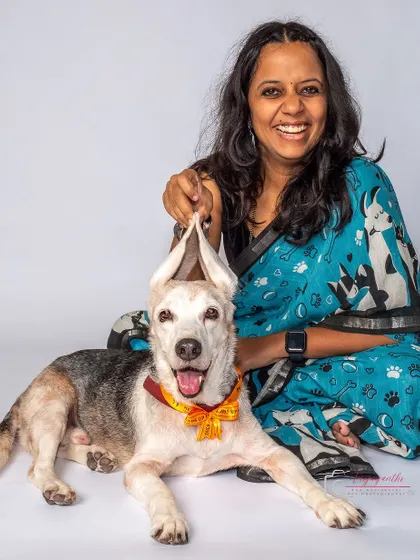 A joyful photo of Seenu and his mom, with his ears playfully held up. Their shared laughter is what makes this shot so special.