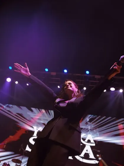 A performer on stage at the Ganga Kinare Music Festival. Even within corporate events, I focus on capturing the entertainment with artistic flair.