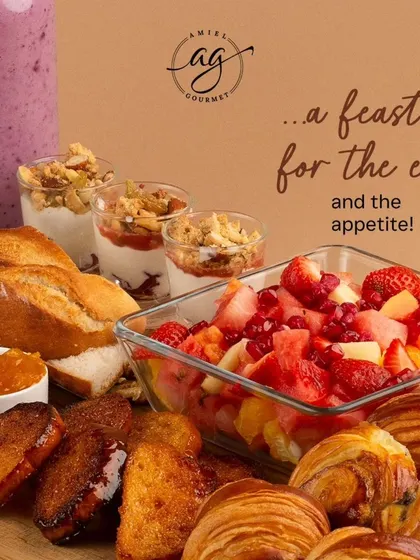 A closer look at my breakfast platter reveals a feast of textures and flavors. You'll find fresh fruit salad, mini parfaits, French toast, and a variety of my signature viennoiseries.