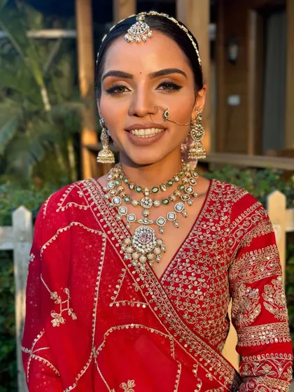 A beautiful smile from the bride. This shot shows how the makeup looks natural and radiant, allowing her personality and happiness to be the main focus.